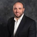 Why 2026 Hotel Budgets Must Prioritize Experiential Tech and AI-Driven Guest Journeys